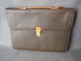 Porte-documents Louis Vuitton en cuir monogrammé avec finitions dorées