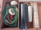 a wooden box with a bunch of wires inside of it