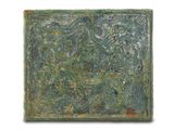 a close up of a green tile with a bird on it