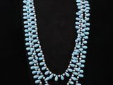a necklace and earring set made from turquoise turquoise beads