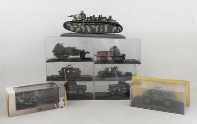 a lot of toy military vehicles in a display case