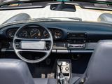 a dashboard of a car with a steering wheel and a dash board