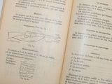 an open book with a drawing of a boat on it