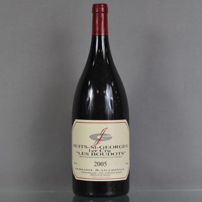 a bottle of wine that is sitting on a table
