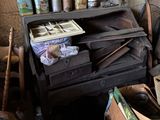 a pile of junk in the corner of a room