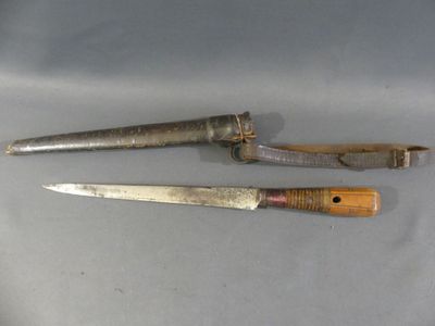 two knives are sitting next to each other on a table