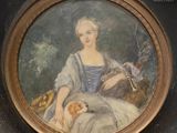 a painting of a woman with a dog in a chair
