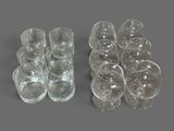 a lot of empty glasses sitting on a table