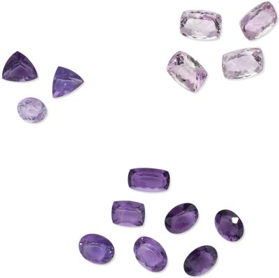 a group of purple amethtites on a white background