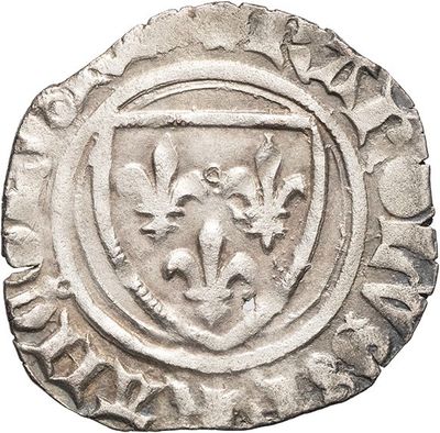 a close up of a silver coin with a coat of arms on it