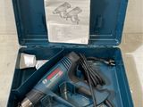 an image of a cordless drill in a blue case