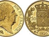 une pièce souveraine en or ornée d'une couronne