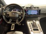 the interior of a car with a steering wheel, dashboard, and dash board