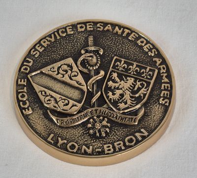 Médaille commémorative en bronze doré de l'Ecole du service …