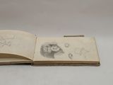 an open book with a drawing of a man and a woman on it