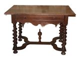 a wooden table with a drawer on top of it