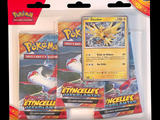 three packs of pokemon trading cards in the package