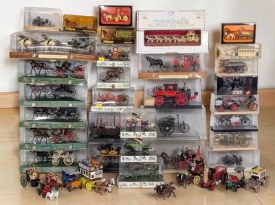 many different types of toy trains and cars on display