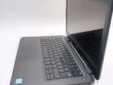 a laptop computer that is sitting on a table