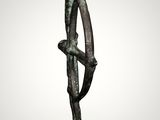 an image of a bronze sculpture of a man holding a tree branch