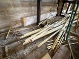 a pile of wood sitting on the floor in a room