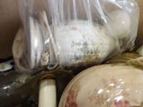 a lot of dishes that are sitting on a table
