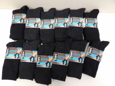 six pairs of men ' s black socks with a tag on them