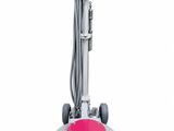 a floor polisher with a red bucket on top of it