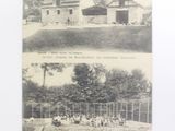 an old black and white photo of a farm and a house