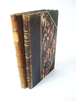 a book that is sitting on a white surface