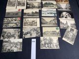 several old black and white photographs of people and buildings
