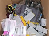 a cardboard box filled with many different types of items