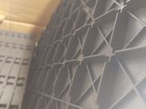 a close up view of a wall made of metal bars