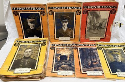 six livres posés sur une table blanche, avec des photos d'hommes en uniforme militaire