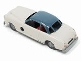 a toy car that is sitting on a white surface