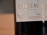 a bottle of wine that is sitting on a table