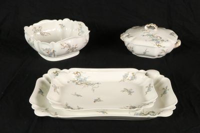 three pieces of porcelain dishes and a bowl on a black background