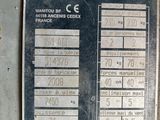 a sign on the side of a machine that says mantov