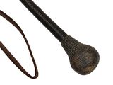an old baseball bat and a lanyard on a white background