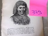 an old book with a pink sticker on it sitting on top of a table