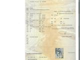 un document sur lequel figure la photo d'un homme