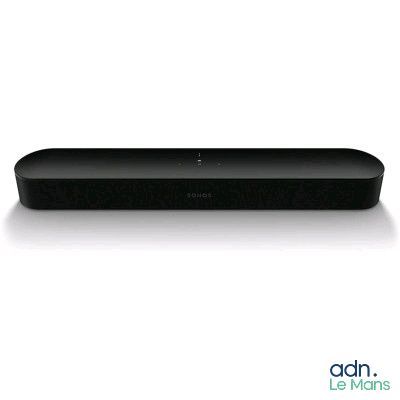 a close up of a black speaker on a white surface
