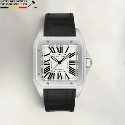 gros plan d'une montre avec des chiffres romains sur le cadran