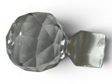 a glass doorknob with a metal handle on a white surface