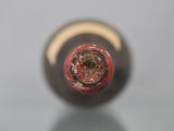 a close up of a bottle of wine with a cork stopper