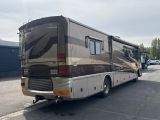 an image of a motor home parked in a parking lot
