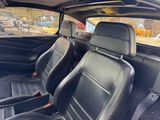 a close up of a car ' s seats in a vehicle