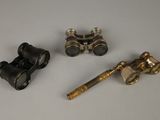 three different types of brass fittings on a white surface
