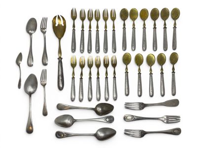 a lot of silver spoons and forks on a white surface