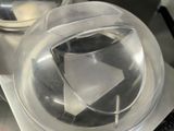 a close up of a plastic object on a table